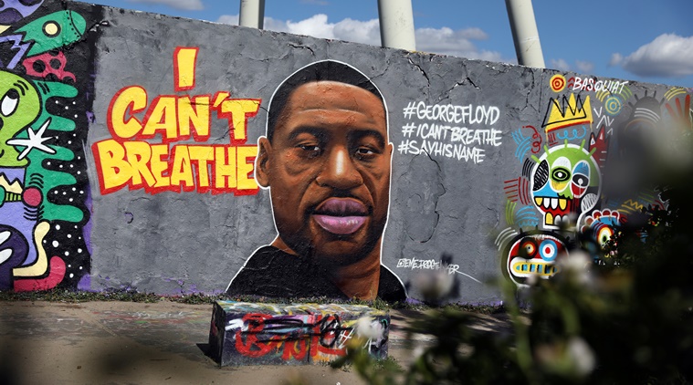 A mural depicting African-American man?George?Floyd killed while in police custody in Minneapolis, U.S., is pictured at Mauerpark in Berlin